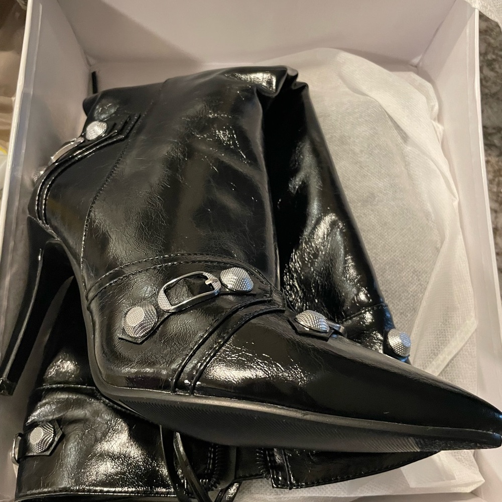 Black knee high boots, worn for a few hours